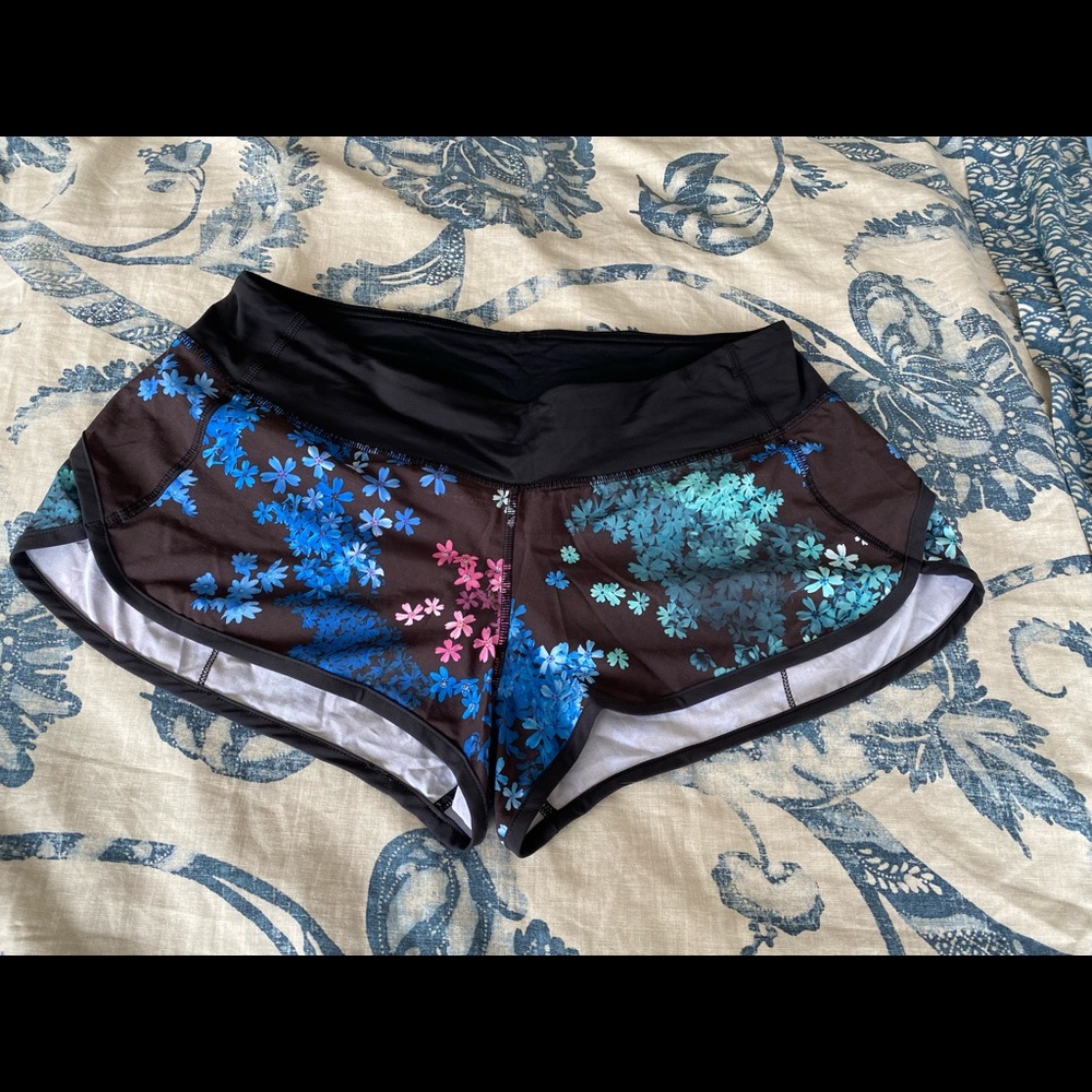 Black floral Lululemon Speed Shorts, size 8